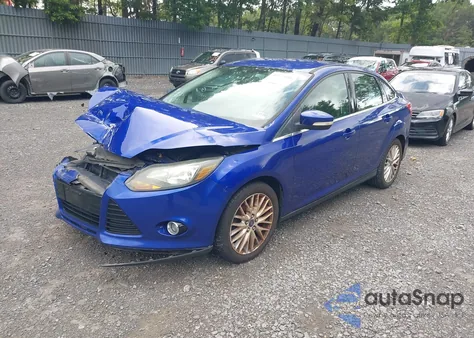 2013 Ford Focus Titanium z USA, uszkodzony, nr VIN 1FADP3J26DL116585